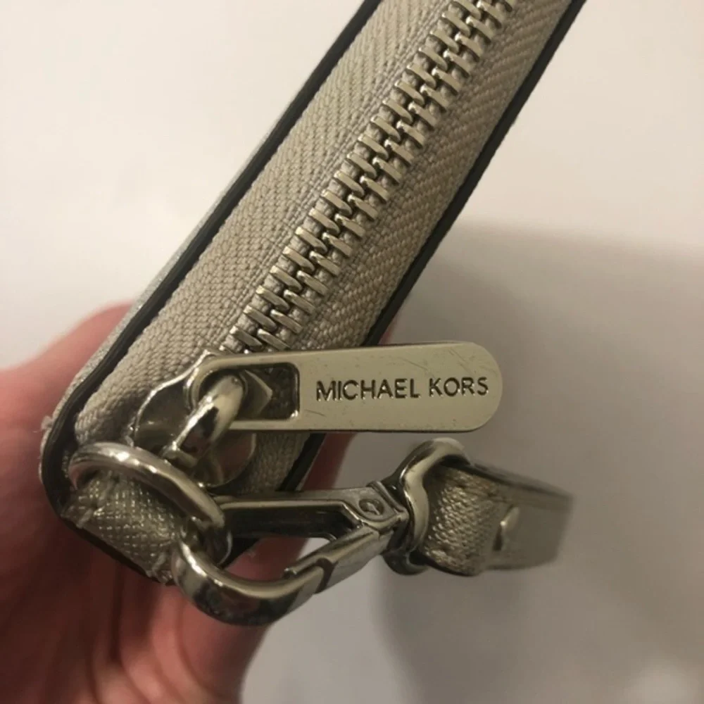 Michael kors silver wristlet wallet clutch